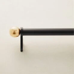 Boule Black Drapery Curtain Rod With Brass Finials