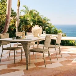Nino Ivory Rattan Outdoor Dining Table -Nesto Store CB2SU23 RC 06A HERO