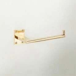 Kela Unlacquered Brass Wall Mounted Toilet Paper Holder